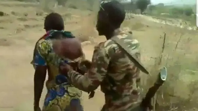 Viral video show deh soldiers take two mami wit dia pikin dem go shoot'am, say deh get connection wit Boko Haram