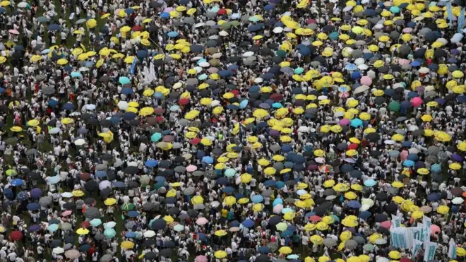 Protesters attend a rally against a controversial extradition law proposal in Hong Kong on June 9, 2019