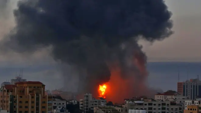 Smoke and flames rise after Israeli warplanes conducted airstrikes in Gaza City.