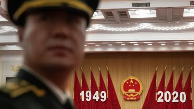 Foto ilustrasi: Seorang anggota grup musik militer China jelang perhelatan hari jadi Republik Rakyat China di sebuah aula, Beijing, 30 September 2020.