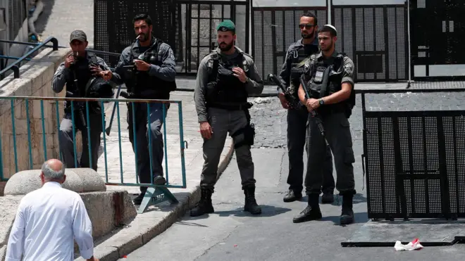 Israeli security forces stand guard outside Lions" Gate, a main entrance to the Al-Aqsa mosque compound in Jerusalem"s Old City, on July 22, 2017.