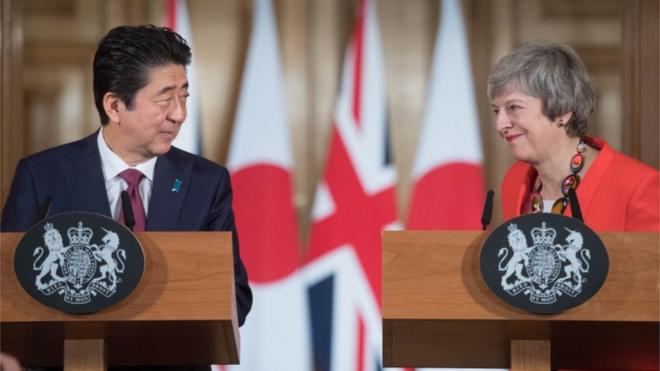 Shinzo Abe and Theresa May on Thursday
