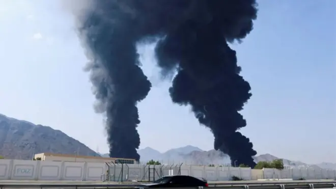 Smoke dey rise from di Fujairah oil industry zone on 14 March