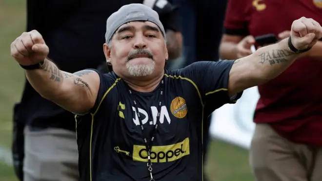 Diago Maradona salutes the Dorados fans with clenched fists on 10 September 2018.