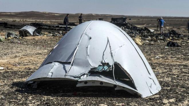 Debris of the A321 Russian airliner lie on the ground a day after the plane crashed in Wadi al-Zolomat, a mountainous area in Egypt's Sinai Peninsula, on 1 November 2015