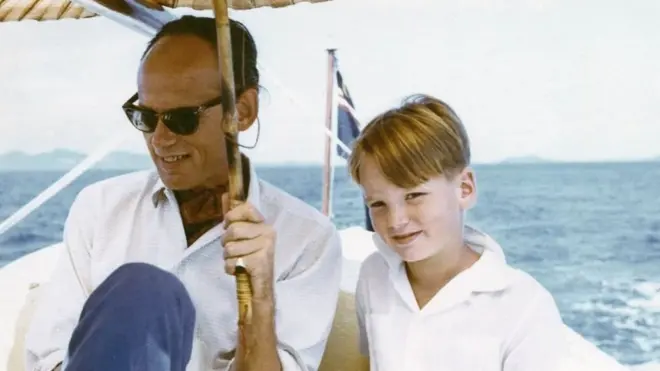 Mark Colvin, aged 7, and his father, off the south coast of Malaysia, 1959.
