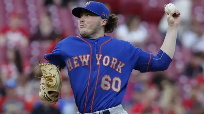 Conlon throws a pitch