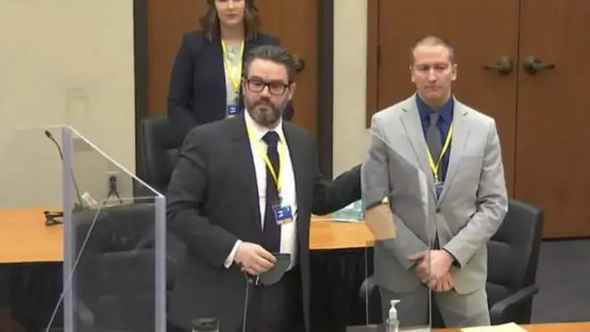 Derek Chauvin and im lawyer Eric Nelson in court