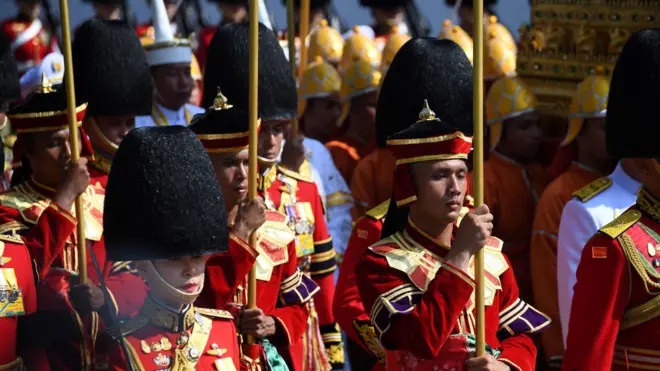 Attendants take part in the funeral procession for the late Thai king Bhumibol Adulyadej in Bangkok on October 26, 2017