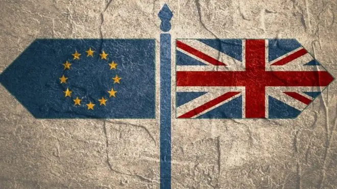 EU and UK flags dey point for opposite directions