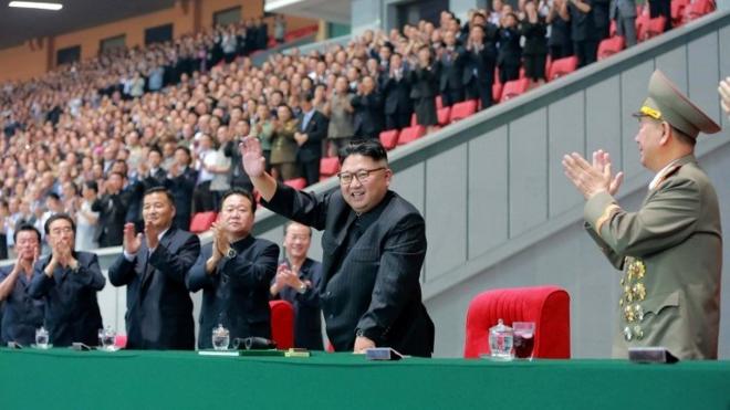 This August 28, 2016 picture released by North Korea"s official Korean Central News Agency (KCNA) on August 29, 2016 shows North Korean leader Kim Jong-Un (C) waving while attending a torchlight gala of members of the youth vanguard "Let the Youth Power March forward Following the Party!" at the May Day Stadium to mark the 9th Congress of the Kim Il Sung Socialist Youth League