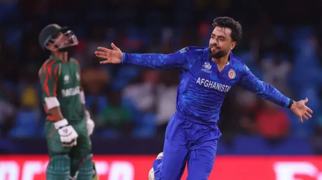 কিংসটাউনের বৃষ্টি বিঘ্নিত এক সন্ধ্যার ম্যাচে ইতিহাস গড়লো আফগানিস্তান, বাংলাদেশের বিপক্ষে বৃষ্টি আইনে ৮ রানের জয় পেয়েছে রশিদ খানের দল।