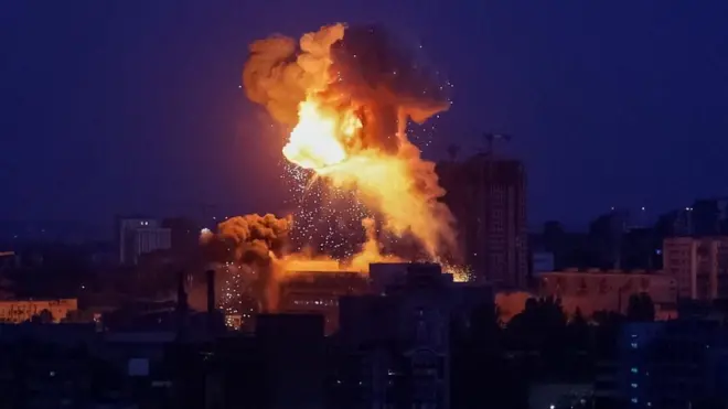 Fire and smoke rise following an explosion during a Russian missile and drone strike