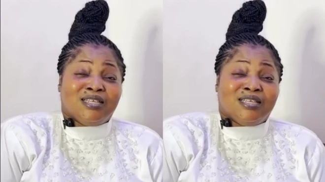 Busola Oke wọ aṣọ funfun, ó ń sunkún