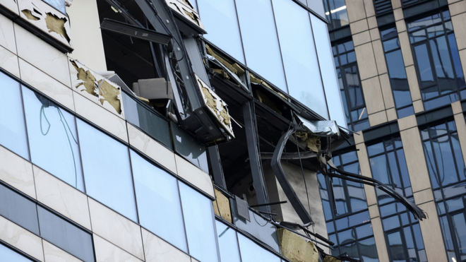 The damaged facade of an office building in Moscow following a reported Ukrainian drone attack