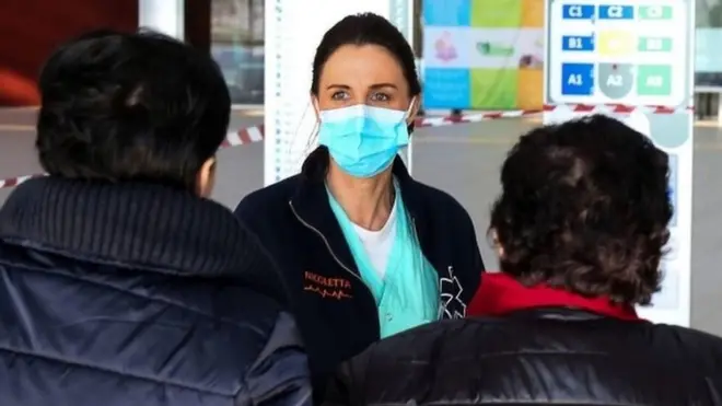 Healthcare professionals at work at the hospital of Schiavonia, northern Italy, 8 March 2020