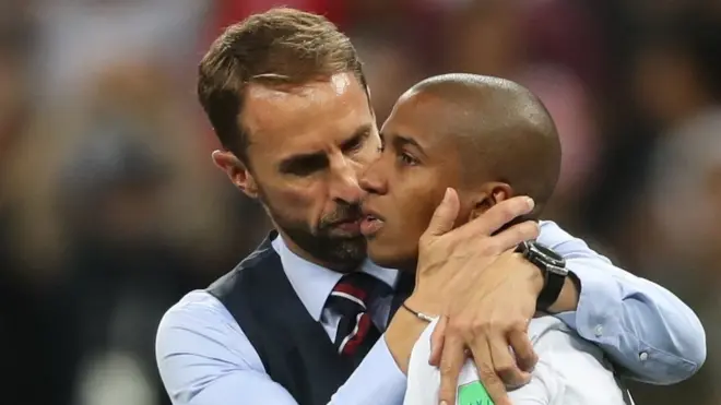 England manager Gareth Southgate consoles Ashley Young