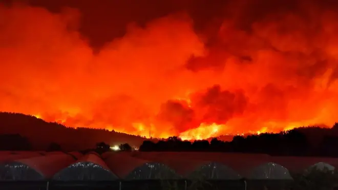 Huge fires are raging on the island of Evia