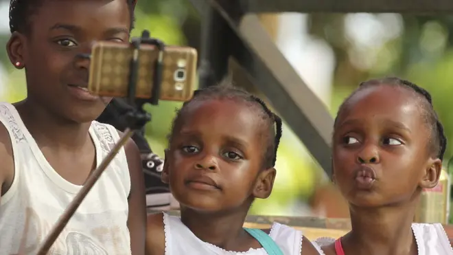 Children taking a selfie at the Harare Sports Club in Harare, Zimbabwe - Sunday 6 November 2016
