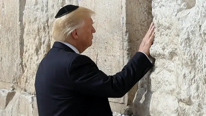 Donald Trump places his hand on the Western Wall in Jerusalem on 22 May 2017
