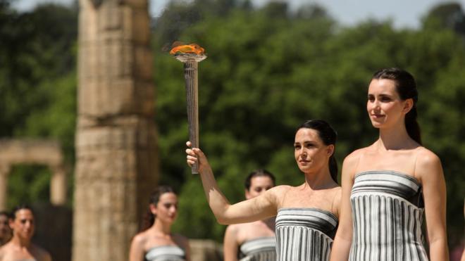 Actors play the role of priestesses and perform during the rehearsal of the Olympic flame lighting ceremony for the Paris 2024 Summer Olympic Games, at the Ancient Olympia site in Peloponnese, southern Greece,15 April 2024. The Lighting ceremony of the Olympic Flame, ahead of the XXXIII Summer Olympic Games 'Paris 2024' which will take place on 16 April 2024.