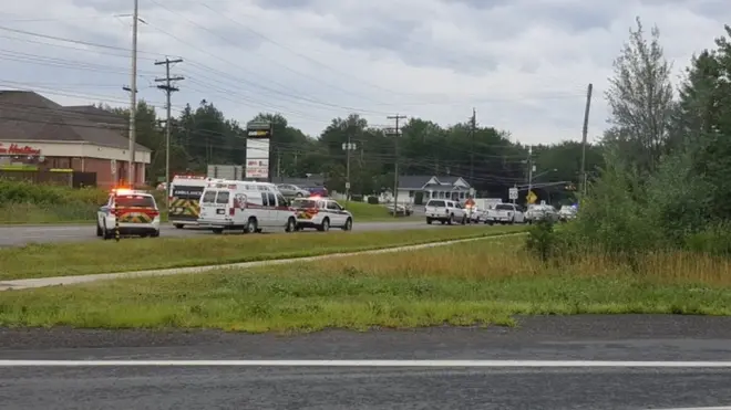 Emergency vehicles pictured near the scene in Fredericton, New Brunswick