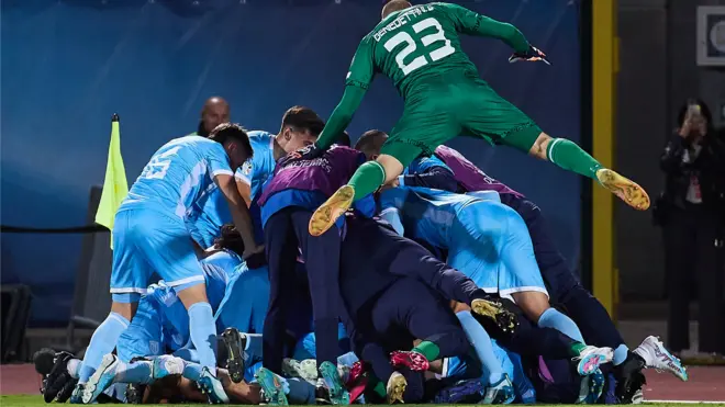 San Marino's players celebrate scoring against Denmark in October 2023