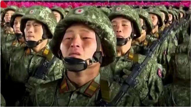 朝鮮官方媒體播出了閲兵情況，並形容最新展示的是「世界上最強的武器」。