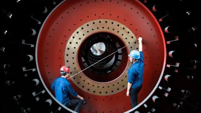 Workers in Jiangsu province, seen here producing equipment for export along China's Belt and Road
