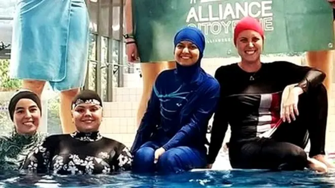 Muslim women defy a ban on burkinis at a community pool in Grenoble, France