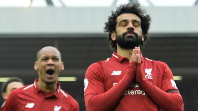 Liverpool goalscorer Mohamed Salah (right)