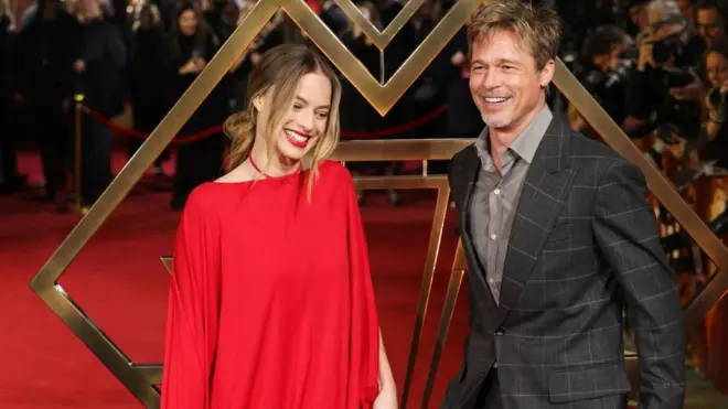 Главные звезды фильма "Вавилон" Марго Робби и Брэд Питт на британской премьер фильма 12 января 2023 года в Лондоне