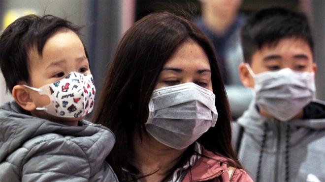 People wearing face masks at a metro station in Taipei, Taiwan