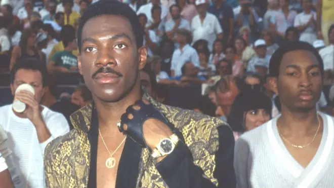 Murphy become global star afta im do di coming to america feem for di 80s