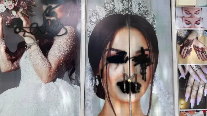 A poster of a bride with her eyes and mouth painted over