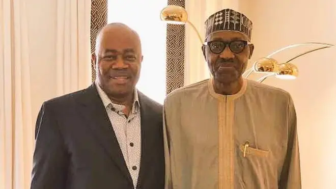 President Muhammadu Buhari and senator Godswill Akpabio