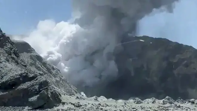 Thick smoke from the volcanic eruption of Whakaari