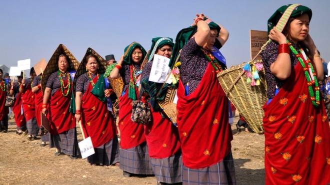 Women from the ethnic Gurung community in traditional attire in Nepal.