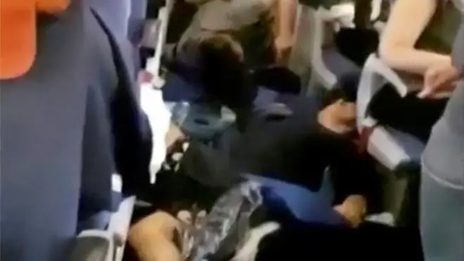 Personas heridas en el suelo del vuelo de Aeroflot.