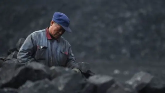 Çinli bir kömür işçisi.