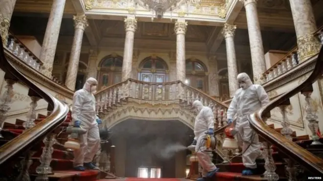 Workers disinfect Dolmabahce Palace in Istanbul