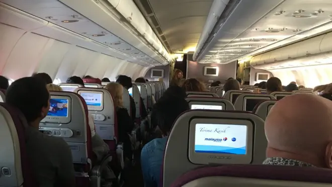 Passengers saw the plane turn around on their monitor