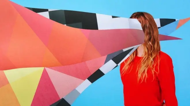 A woman with colours going through her head