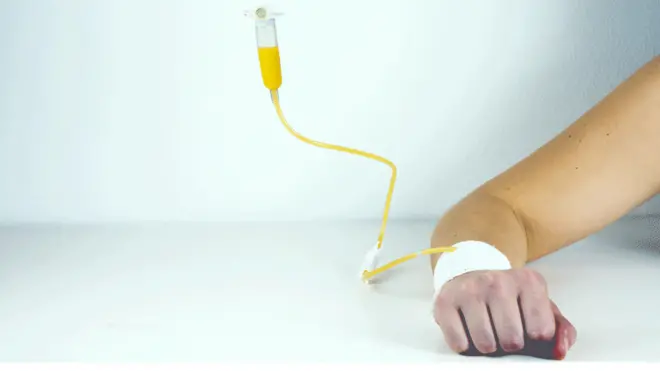 Orange juice going into a vein