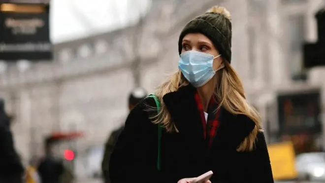 woman with mask on street