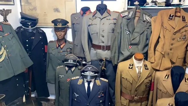 Nazi clothes are seen in a home of an alleged paedophile in Rio de Janeiro