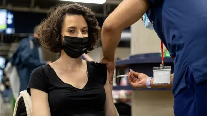 Woman receiving Covid vaccination