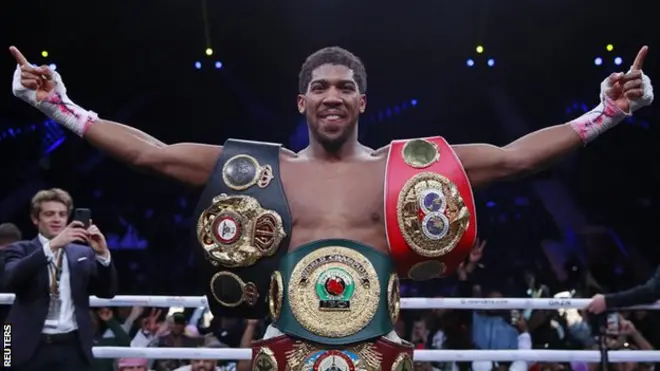 Anthony Joshua win all im world titles backdi first time wey im try am