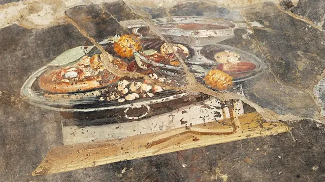 A newly excavated fresco in Pompeii depicting a flatbread that could be the precursor to the modern-day pizza