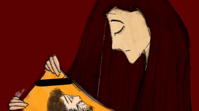 امرأة وصورة رجل